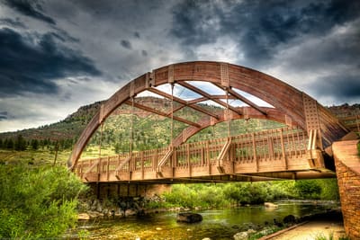 The wooden arch of the Apple Valley Road bridge over the North St. Vrain