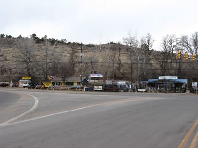 Shops and traffic lights at the junction of US 36 and Colorado 66 at the east end of Lyons