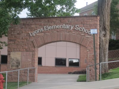 The sandstone arch entrance of Lyons Elementary School